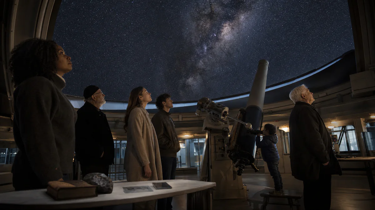 People of different beliefs share a night of observation beneath an open telescope dome